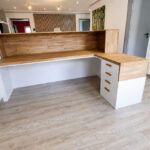 White reception desk for a dental office in Germany