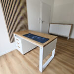 A white desk with an oak tabletop and a storage unit for Medinal in Katowice
