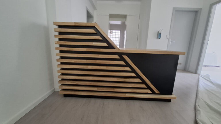 A small reception desk for the Greenfield physical therapy practice in Schopfheim, Germany