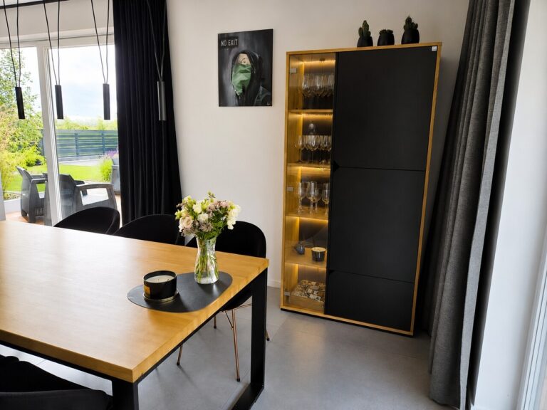 dining table with an oak tabletop and a display cabinet with LED lighting
