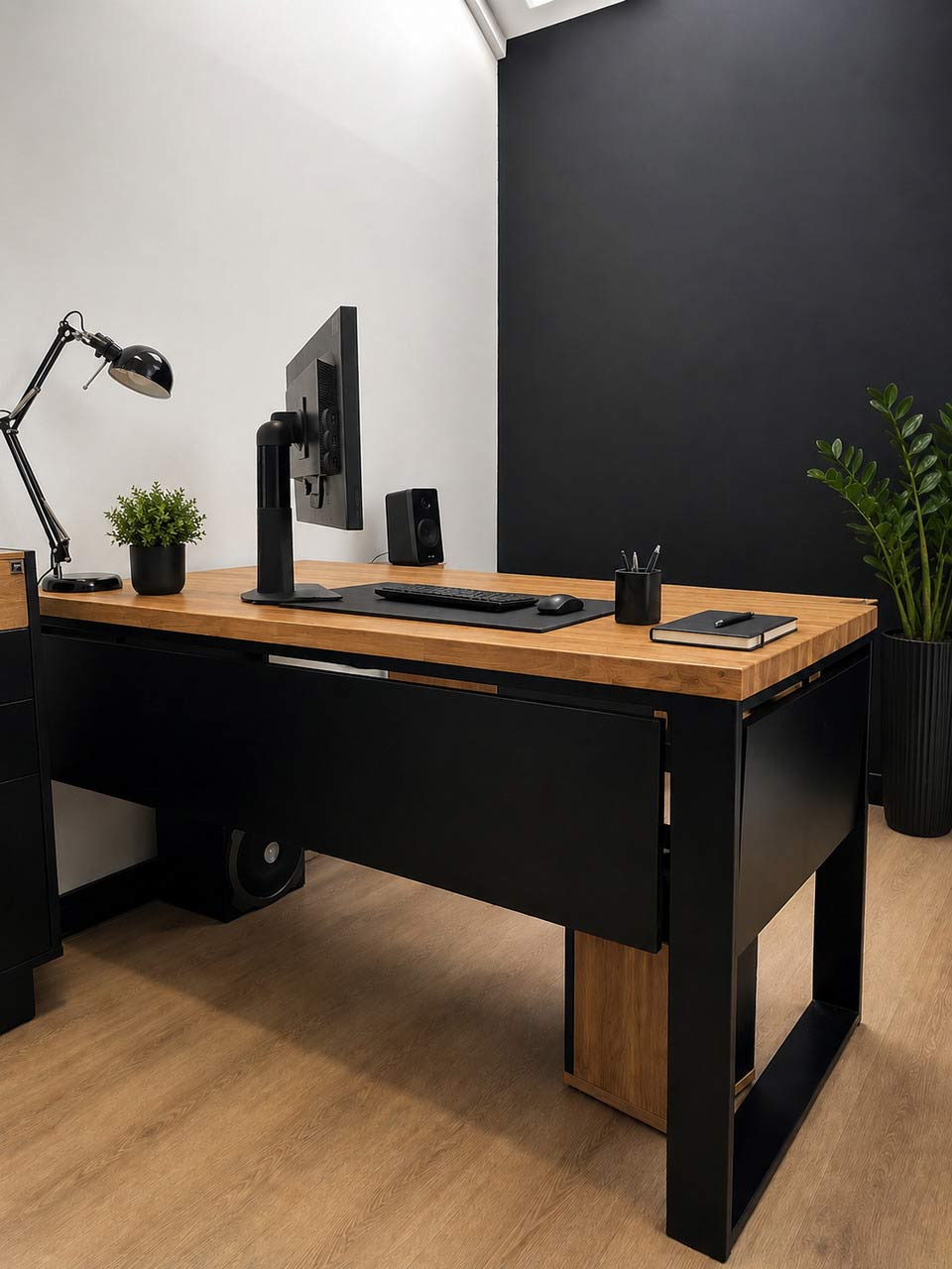 A corner desk in a small room