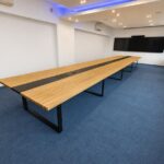 Conference table with media ports recessed into the tabletop