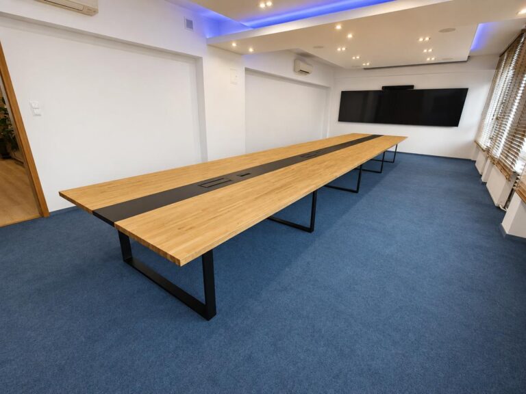 Conference table with media ports recessed into the tabletop