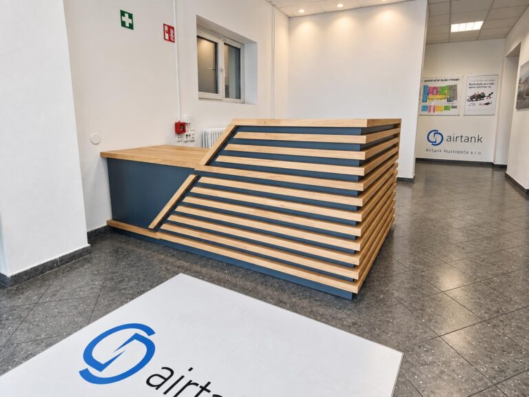 A custom-made navy blue reception desk for the company's headquarters