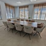 Conference table with cable grommets