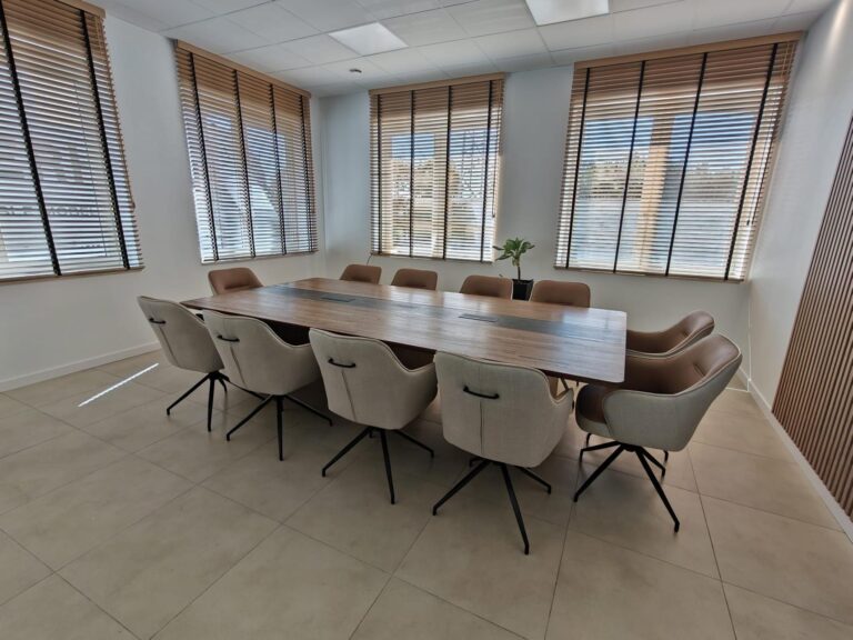 Conference table with cable grommets