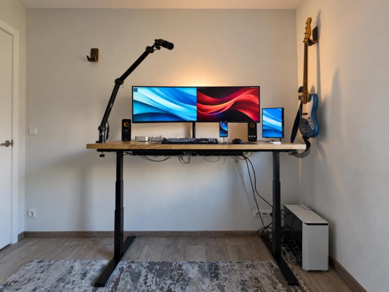 Electric desk with an oak tabletop for working on a computer in a home office