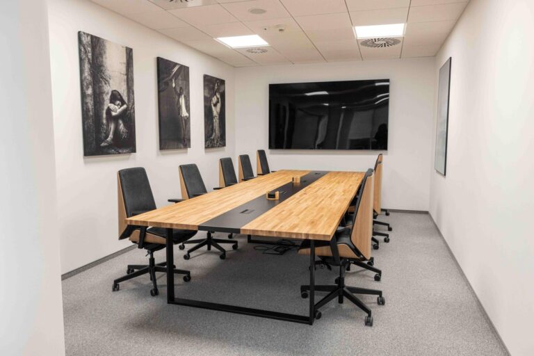 Large conference table with an oak tabletop