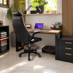 A modern home office with a desk, a filing cabinet, a dresser, and storage space