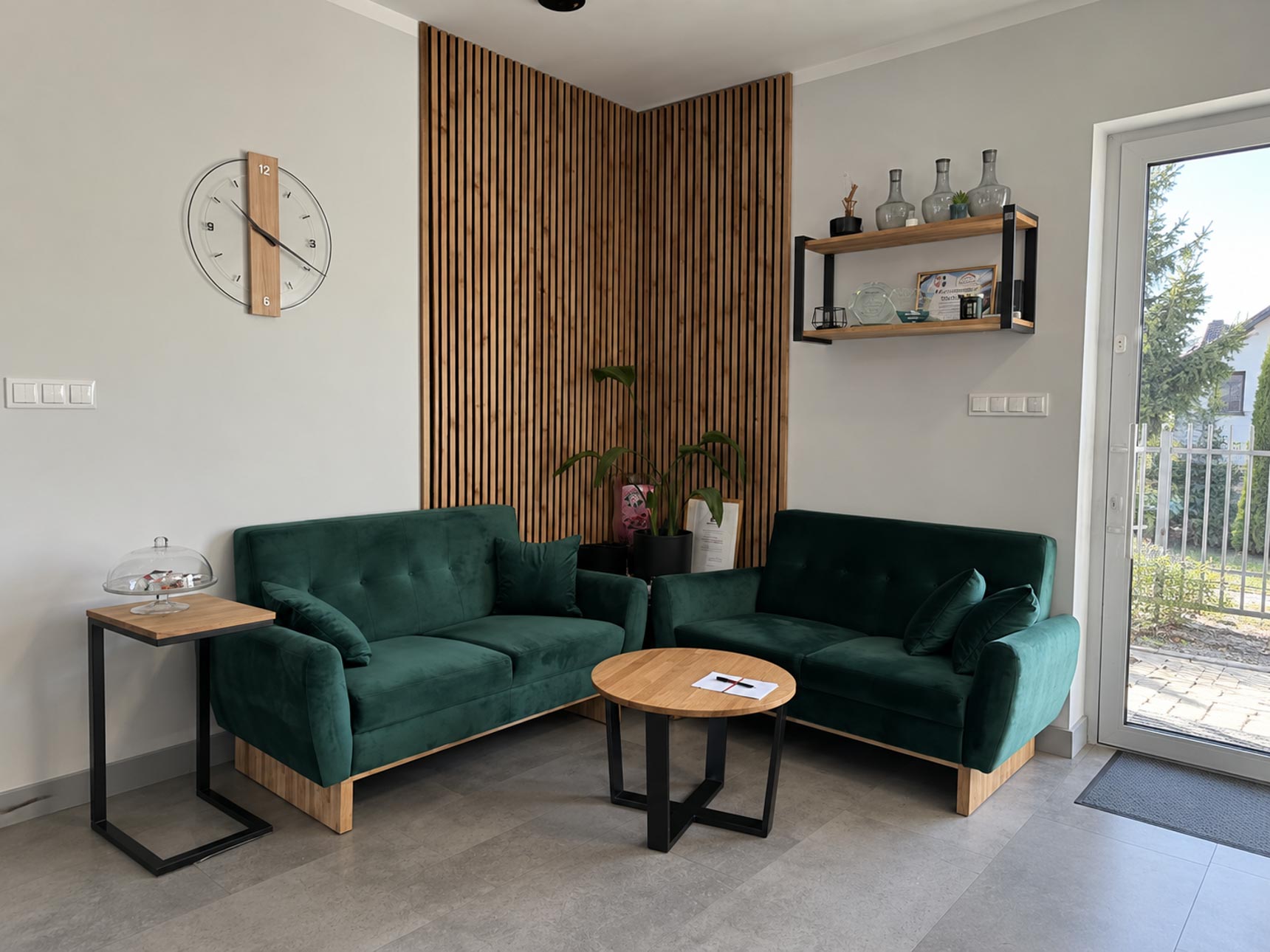 A lounge area with a wooden coffee table and a side table